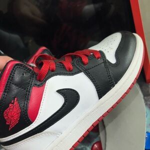 Nike Air Jordan Black, White, and Red Sneakers